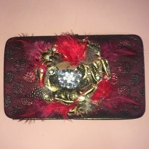 Feathered Hand clutch.